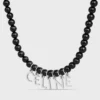 Collana CELINE Monochroms con perline in onice e ottone con finitura in rodio Collana CELINE Monochroms con perline in onice e ottone con finitura in rodio