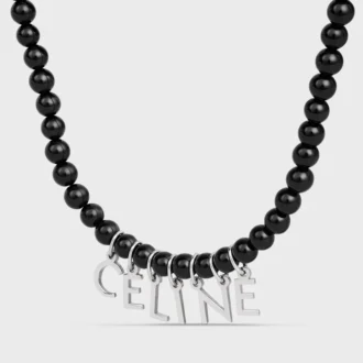 Collana CELINE Monochroms con perline in onice e ottone con finitura in rodio