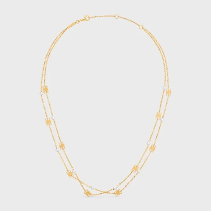 Collana doppia Triomphe Pearl in ottone con finitura dorata e perle in resina Collana doppia Triomphe Pearl in ottone con finitura dorata e perle in resina
