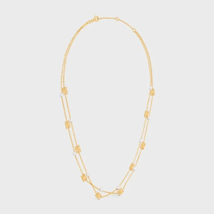 Collana doppia Triomphe Pearl in ottone con finitura dorata e perle in resina Collana doppia Triomphe Pearl in ottone con finitura dorata e perle in resina