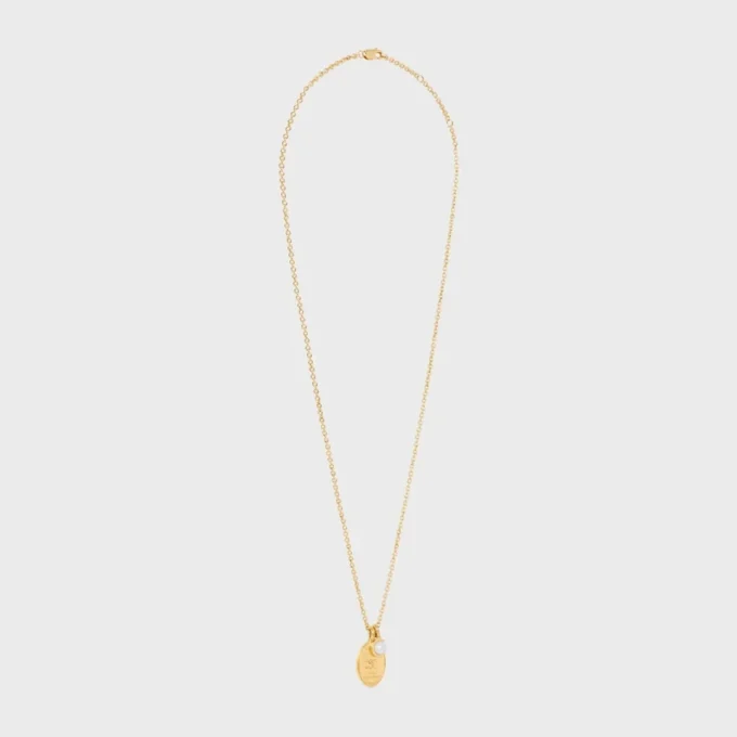 Collana Les Perles CELINE con medaglia in resina perlata e ottone con finitura dorata Collana Les Perles CELINE con medaglia in resina perlata e ottone con finitura dorata