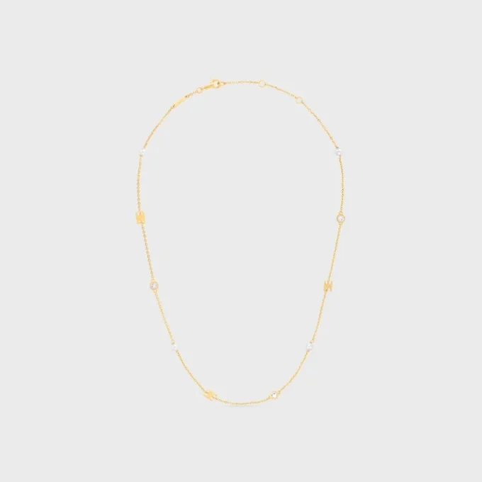 Collana Les Perles CELINE in strass, perle in resina e ottone con finitura dorata Collana Les Perles CELINE in strass, perle in resina e ottone con finitura dorata