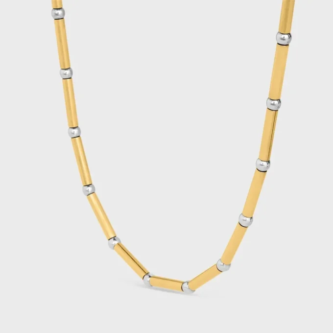 Collana lunga con ciondoli in ottone con finitura in oro e rodio Collana lunga con ciondoli in ottone con finitura in oro e rodio