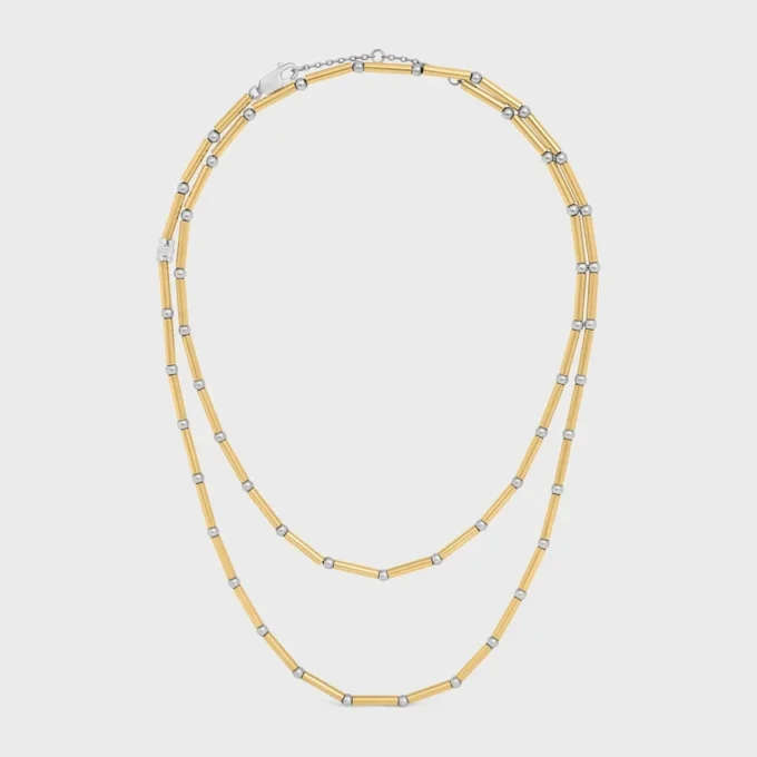 Collana lunga con ciondoli in ottone con finitura in oro e rodio Collana lunga con ciondoli in ottone con finitura in oro e rodio