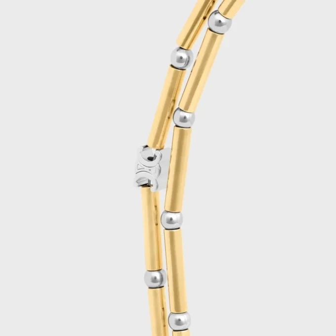 Collana lunga con ciondoli in ottone con finitura in oro e rodio Collana lunga con ciondoli in ottone con finitura in oro e rodio