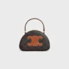 Custodia Half Moon in Triomphe Canvas e pelle di vitello Custodia Half Moon in Triomphe Canvas e pelle di vitello