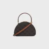 Custodia Half Moon in Triomphe Canvas e pelle di vitello Custodia Half Moon in Triomphe Canvas e pelle di vitello