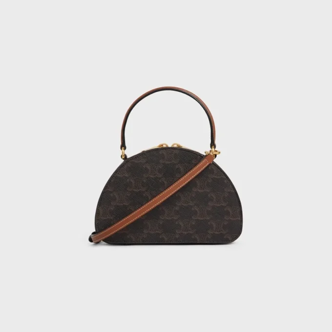 Custodia Half Moon in Triomphe Canvas e pelle di vitello Custodia Half Moon in Triomphe Canvas e pelle di vitello