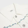 Giacca da camionista ricamata in denim bianco raw wash