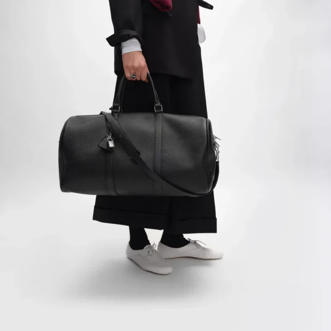 Grande borsa da viaggio in pelle di vitello martellata
