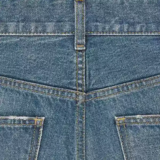 Jeans a zampa Dylan con firma in denim di cotone Jeans a zampa Dylan con firma in denim di cotone