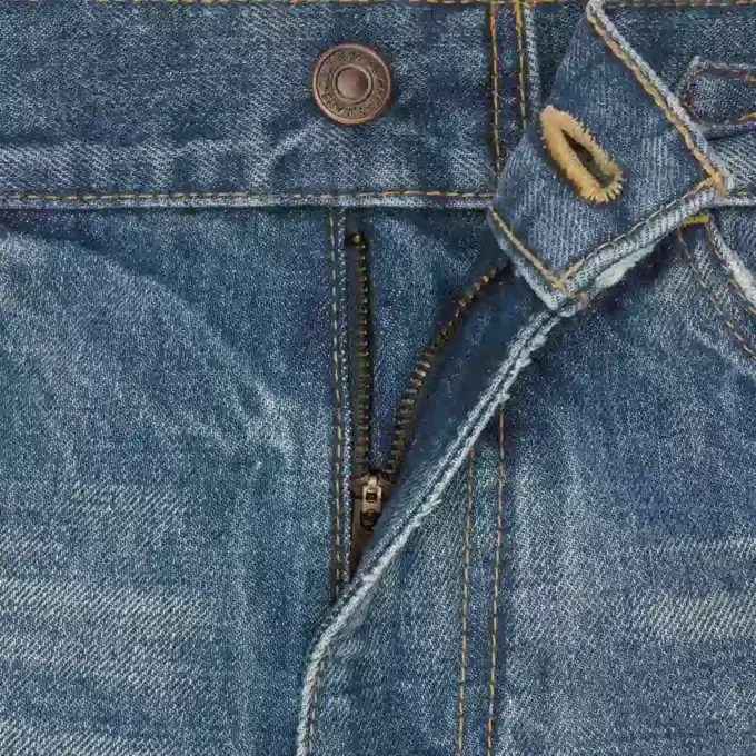 Jeans a zampa Dylan con firma in denim di cotone Jeans a zampa Dylan con firma in denim di cotone