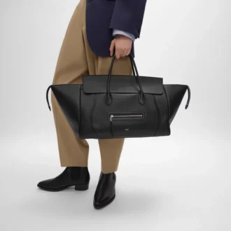 Luggage grande in pelle di vitello martellata