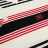 Maglione polo in cotone a righe