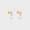 Orecchini Les Perles CELINE in ottone con finitura dorata e perle in resina Orecchini Les Perles CELINE in ottone con finitura dorata e perle in resina