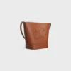 Piccola borsa a secchiello Cuir Triomphe in pelle di vitello liscia Piccola borsa a secchiello Cuir Triomphe in pelle di vitello liscia