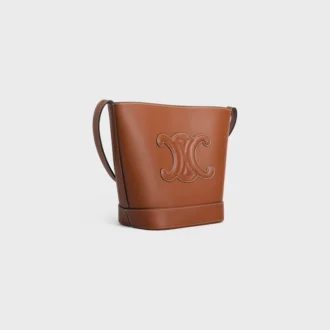 Piccola borsa a secchiello Cuir Triomphe in pelle di vitello liscia