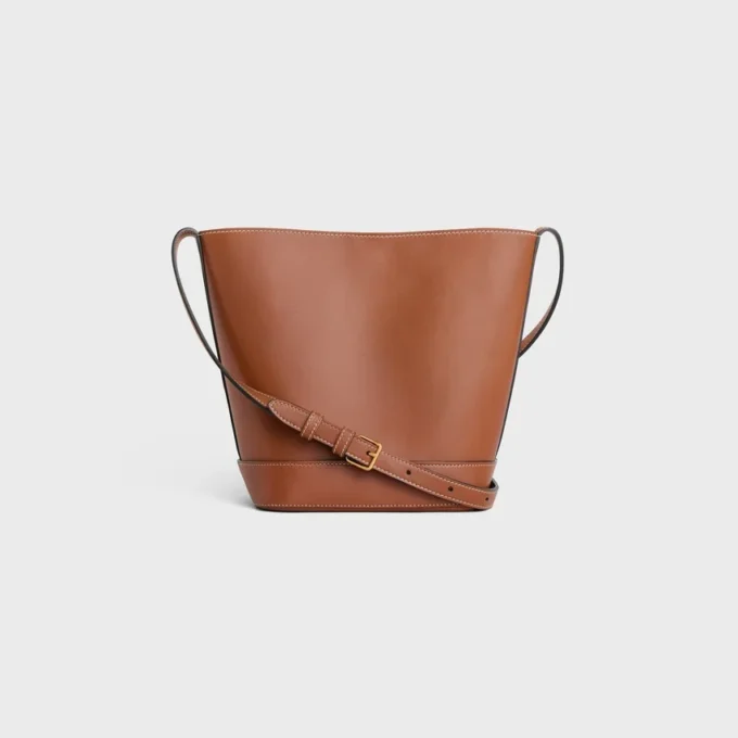 Piccola borsa a secchiello Cuir Triomphe in pelle di vitello liscia Piccola borsa a secchiello Cuir Triomphe in pelle di vitello liscia