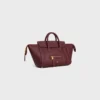 Piccola borsa di Luggage in pelle di vitello martellata Piccola borsa di Luggage in pelle di vitello martellata