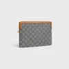 Piccola pochette con tracolla in Cuir Triomphe in Jacquard Triomphe su tutta la superficie Piccola pochette con tracolla in Cuir Triomphe in Jacquard Triomphe su tutta la superficie