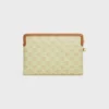Piccola pochette con tracolla in pelle Cuir Triomphe e tela Toile Triomphe Piccola pochette con tracolla in pelle Cuir Triomphe e tela Toile Triomphe