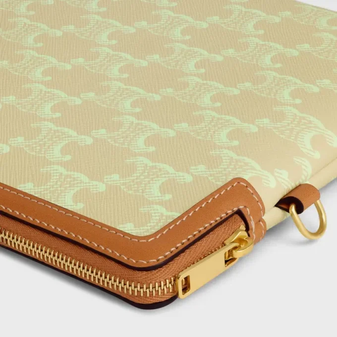 Piccola pochette con tracolla in pelle Cuir Triomphe e tela Toile Triomphe Piccola pochette con tracolla in pelle Cuir Triomphe e tela Toile Triomphe
