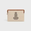 Piccola pochette con tracolla in tessuto con ricamo a forma di ancora e pelle di vitello Piccola pochette con tracolla in tessuto con ricamo a forma di ancora e pelle di vitello
