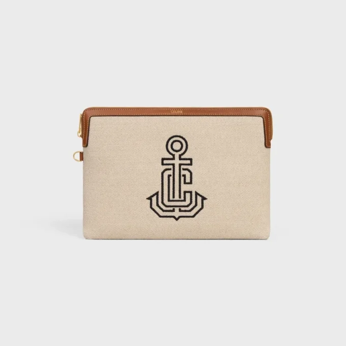 Piccola pochette con tracolla in tessuto con ricamo a forma di ancora e pelle di vitello Piccola pochette con tracolla in tessuto con ricamo a forma di ancora e pelle di vitello