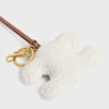 Portachiavi Triomphe Pom-Pom in cotone lavorato all’uncinetto con finiture dorate Portachiavi Triomphe Pom-Pom in cotone lavorato all’uncinetto con finiture dorate