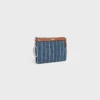 Portamonete in denim a righe con strass Portamonete in denim a righe con strass