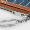 Portamonete in denim a righe con strass Portamonete in denim a righe con strass