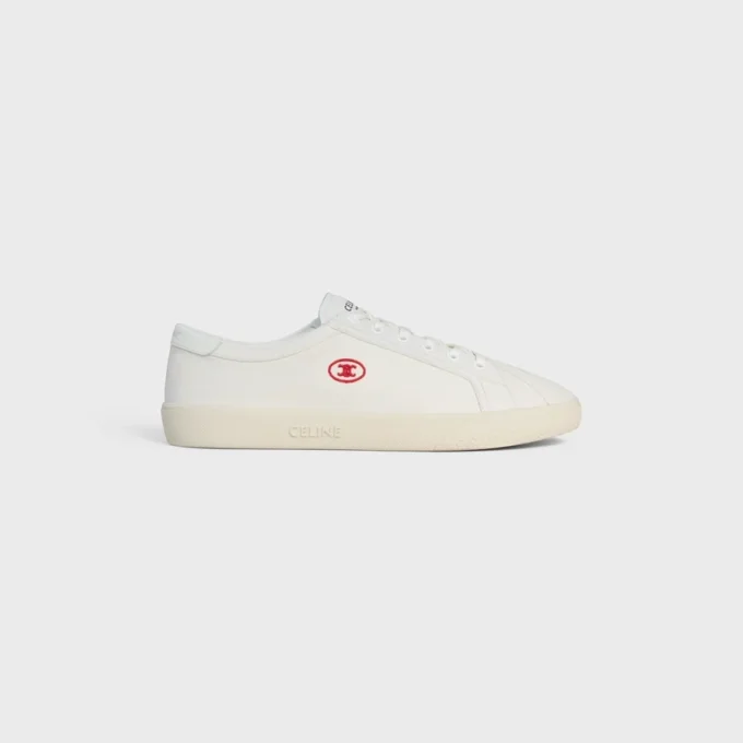 Sneaker CELINE Lou Low con lacci e logo Triomphe in tela e pelle di vitello Sneaker CELINE Lou Low con lacci e logo Triomphe in tela e pelle di vitello