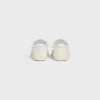 Sneaker CELINE Lou Low con lacci e logo Triomphe in tela e pelle di vitello Sneaker CELINE Lou Low con lacci e logo Triomphe in tela e pelle di vitello