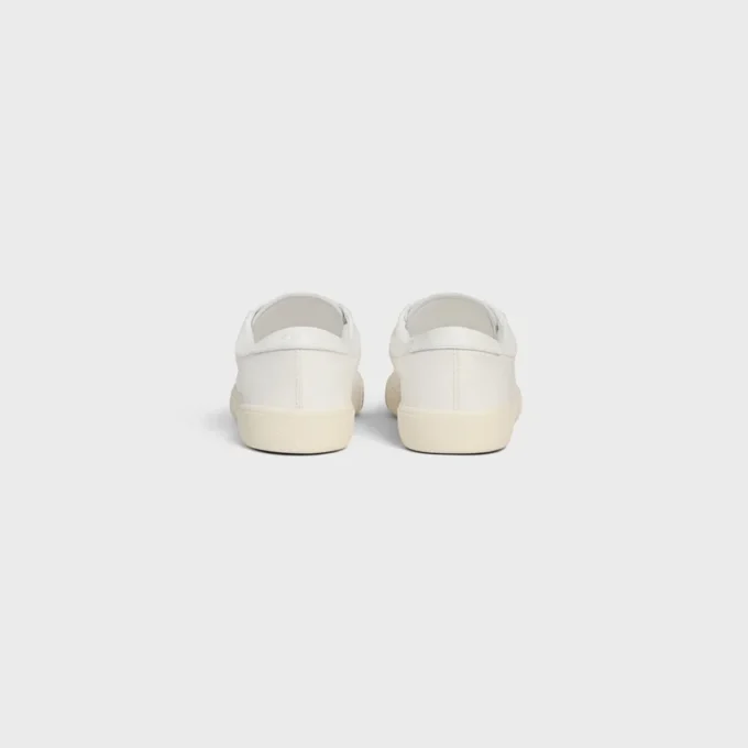 Sneaker CELINE Lou Low con lacci e logo Triomphe in tela e pelle di vitello Sneaker CELINE Lou Low con lacci e logo Triomphe in tela e pelle di vitello