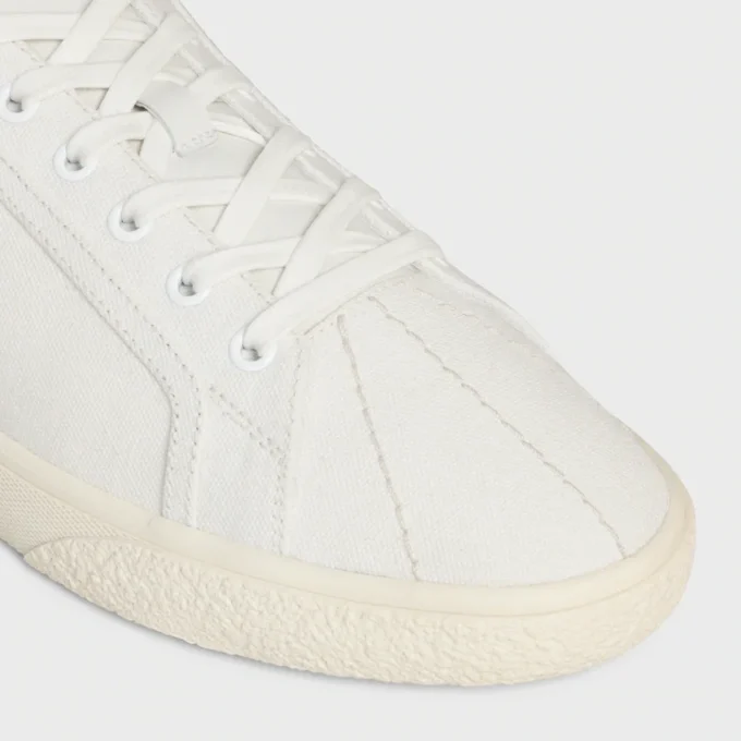 Sneaker CELINE Lou Low con lacci e logo Triomphe in tela e pelle di vitello Sneaker CELINE Lou Low con lacci e logo Triomphe in tela e pelle di vitello