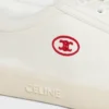 Sneaker CELINE Lou Low con lacci e logo Triomphe in tela e pelle di vitello Sneaker CELINE Lou Low con lacci e logo Triomphe in tela e pelle di vitello