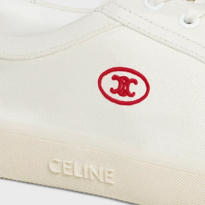 Sneaker CELINE Lou Low con lacci e logo Triomphe in tela e pelle di vitello Sneaker CELINE Lou Low con lacci e logo Triomphe in tela e pelle di vitello